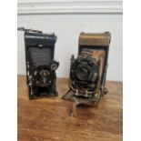 Two folding bellows cameras