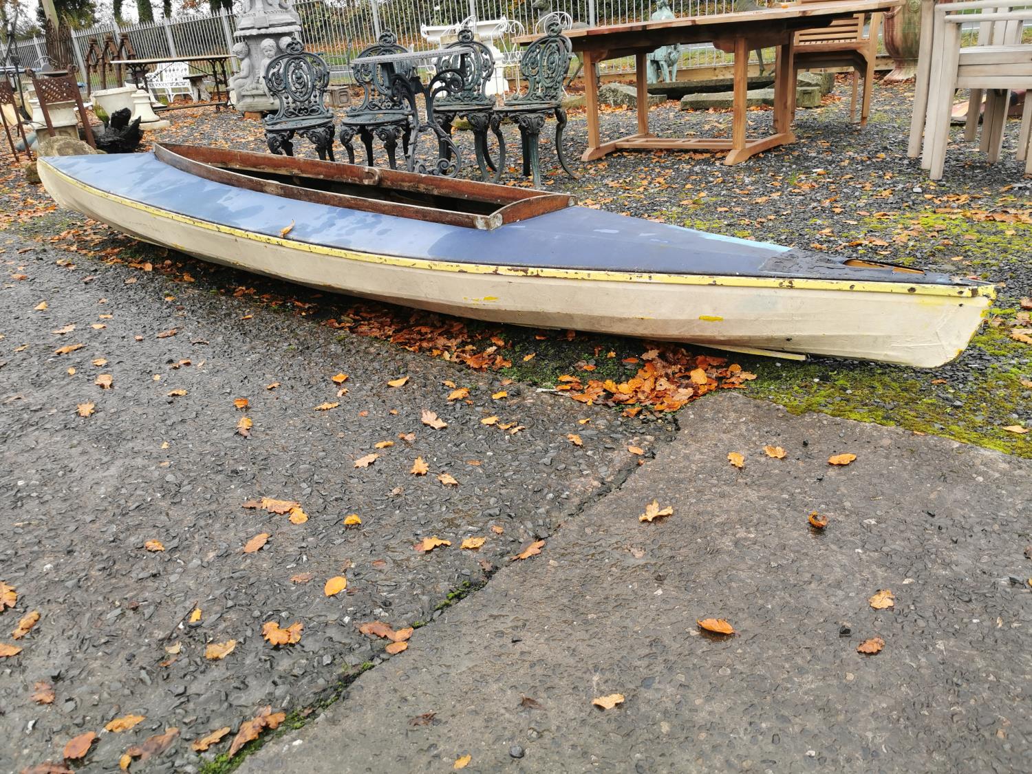 1950s canvas and timber canoe.