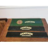 Three Jameson drip mats