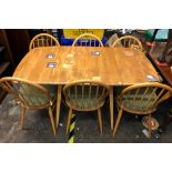 ERCOL LIGHT ELM DROP FLAP DINING TABLE AND SIX DINING CHAIRS