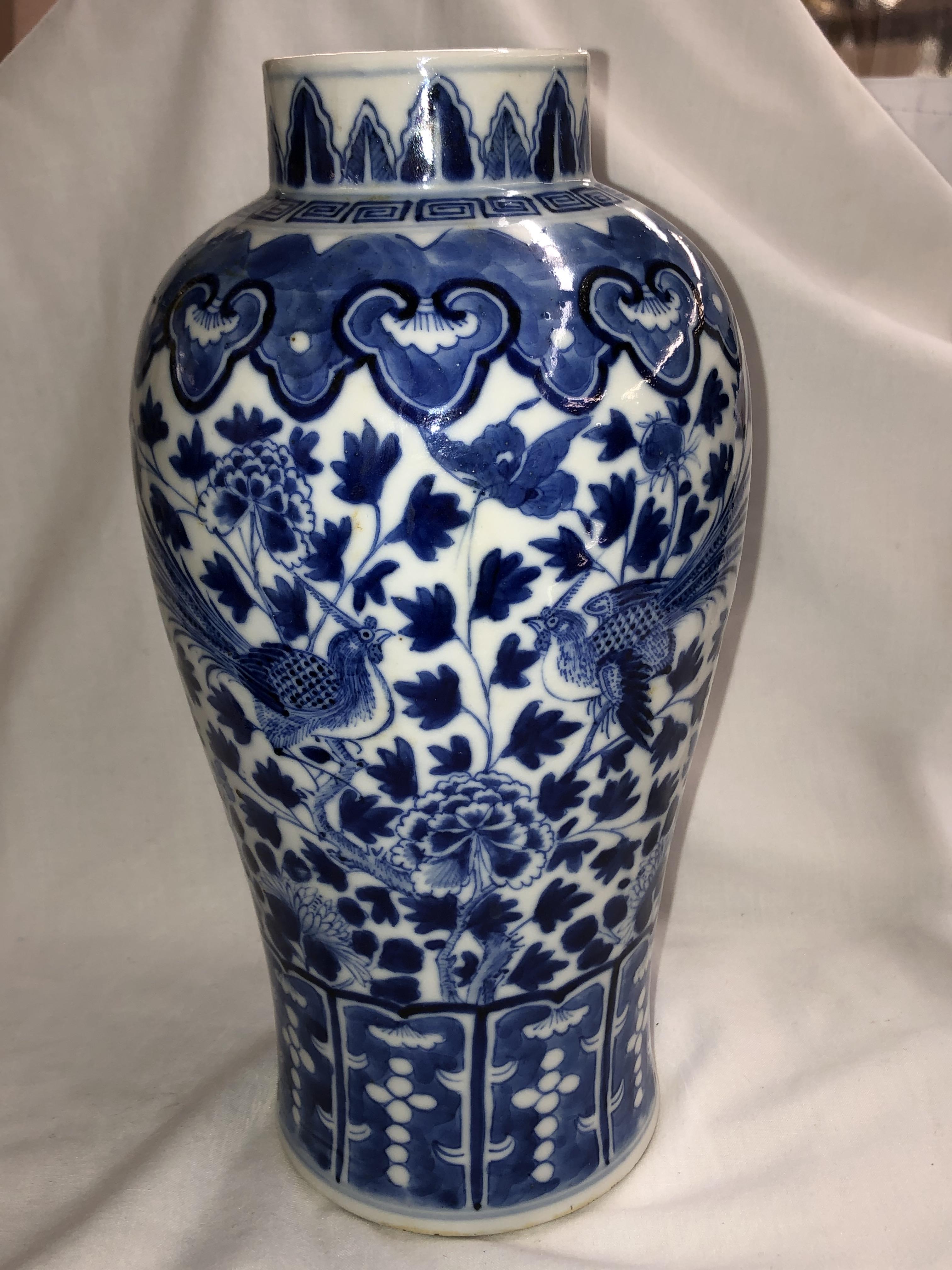 CHINESE BLUE AND WHITE BALUSTER VASE DECORATED WITH FANCIFUL BIRDS AMIDST FOLIAGE,