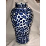 CHINESE BLUE AND WHITE BALUSTER VASE DECORATED WITH FANCIFUL BIRDS AMIDST FOLIAGE,