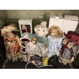 BOXED PORCELAIN HEADED DOLLS AND A MOUSE DOORSTOP