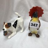 BESWICK PENGUIN WITH UMBRELLA AND A ROYAL DOULTON DOG FIGURE
