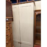 CREAM PANEL TWO DOOR WARDROBE AND MATCHING BEDSIDE CUPBOARD WITH DRAWER
