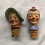 TWO GOEBEL CERAMIC HEAD BOTTLE STOPPERS/POURERS