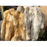RED FOX GILET AND A LIGHT COLOURED FUR COAT