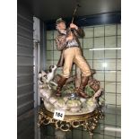 CAPO DI MONTE FISHERMAN FIGURE ON GILT METAL BASE