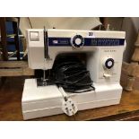 NEW HOME ELECTRIC SEWING MACHINE