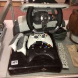 XBOX 360 CONSOLE AND A DRIVING RIG