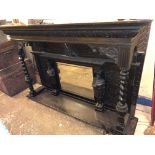 VICTORIAN CARVED OVERMANTEL MIRROR WITH MOULDED PEDIMENT THE CENTRAL MIRROR FLANKED BY MEDIEVAL