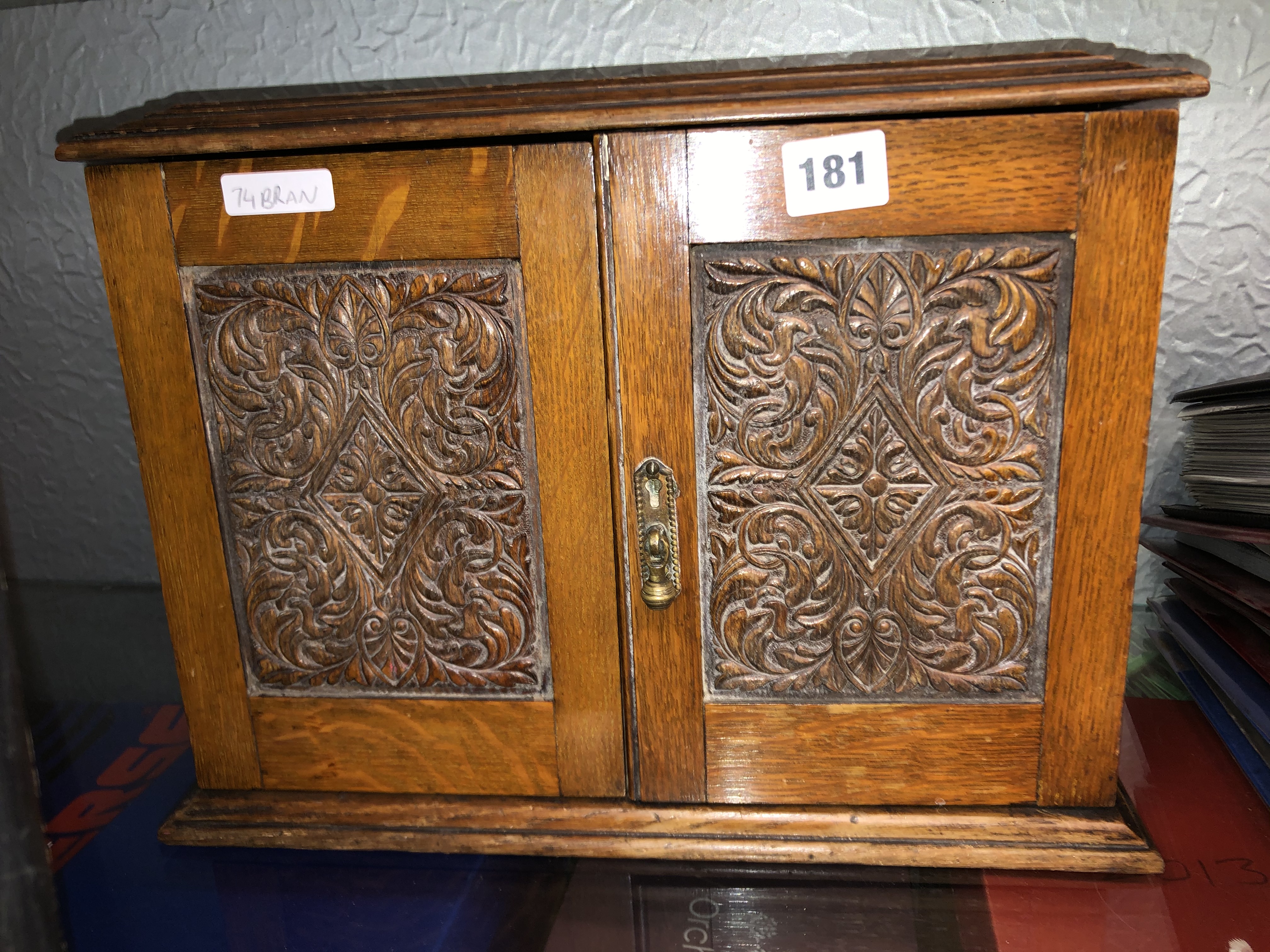 EDWARDIAN OAK CARVED TWO DOOR SMOKERS CABINET 28CM H X 37CM W X 20CM D