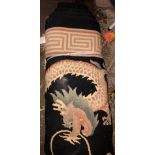 CHINESE WOOLEN FRINGED CARPET DECORATED WITH DRAGON ON BLACK GROUND WITH A GREEK KEY DESIGN BORDER