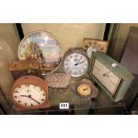 SHELF OF VINTAGE ALARM AND MANTEL CLOCKS