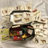 TIN OF VARIOUS CIGARETTE CARDS LOOSE AND MODEL TOY CARS