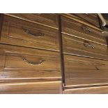 TEAK EFFECT THREE DRAWER CHEST AND MATCHING THREE DRAWER BEDSIDE CHEST 82CM H X 77CM W X 39CM D,