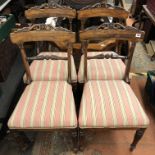 FOUR GEORGE IV ROSEWOOD CRESTED BAR BACK CHAIRS WITH TULIP PETAL CAPPED TAPERED LEGS
