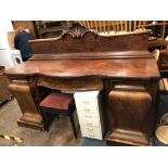 WILLIAM IV MAHOGANY SERPENTINE TWIN PEDESTAL SIDEBOARD WITH SHELL CARVED AND CRESTED GALLERY BACK