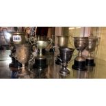 ONE SILVER AND SIX EPNS MINIATURE TROPHIES