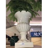 LARGE POTTERY LOBED PLANTER WITH ARTIFICIAL PLANT