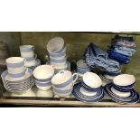 CONRAN SHOP LARGE AND BLUE WHITE STRIPED CUPS AND SAUCERS,