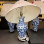 THREE CHINESE BLUE AND WHITE BALUSTER TABLE LAMPS AND SHADES