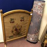 BLUE PATTERNED CARPET RUNNER AND A TAPESTRY FIRE SCREEN