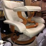 STRESSLESS STYLE CREAM LEATHER SWIVEL CHAIR AND MATCHING FOOTSTOOL