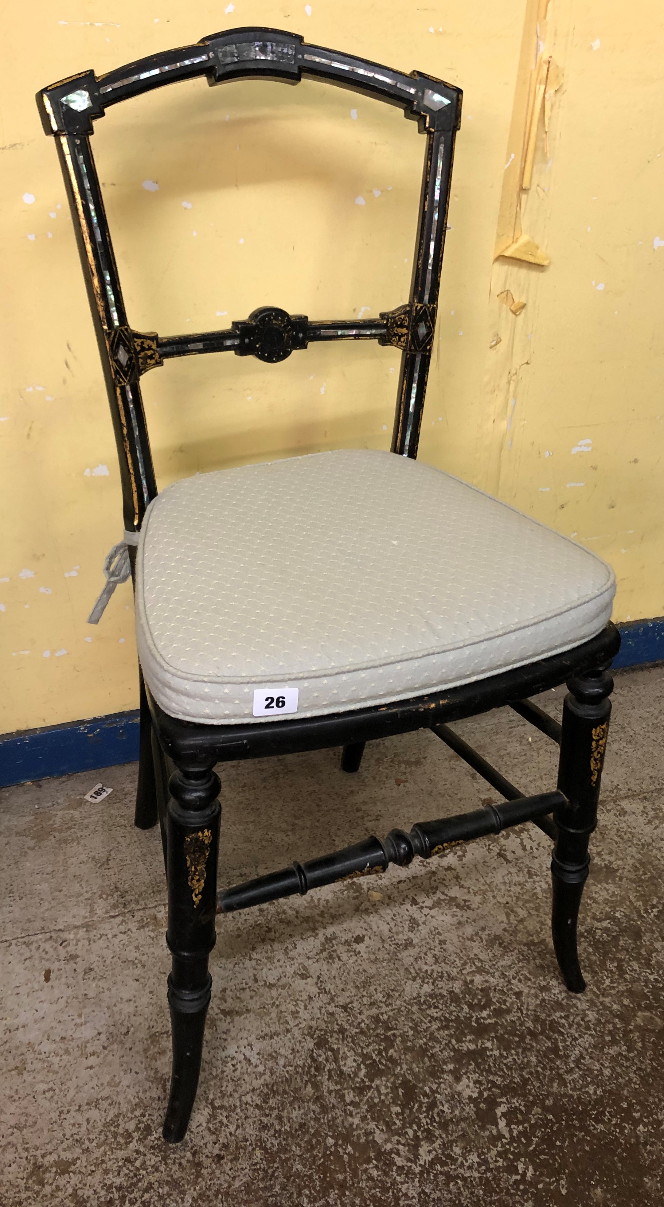 VICTORIAN EBONISED MOTHER OF PEARL INLAID AND GILDED BERGERE CHAIR