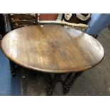 17TH CENTURY STYLE OAK GATELEG TABLE AND FOUR LADDERBACK RUSH SEATED CHAIRS 136CM X 92CM X 76CM