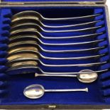CASED SET OF WALKER AND HALL SHEFFIELD NINE SPOONS AND TWO SHEFFIELD TEASPOONS 14.