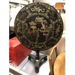 EBONISED GILT CHINOISERIE DECORATED CIRCULAR TILT TOP PEDESTAL TABLE