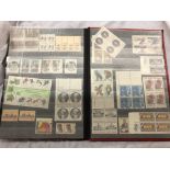 STAMP ALBUM CONTAINING GB AND WORLD POSTAGE STAMPS
