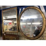 GILTWOOD DISTRESSED OVAL MIRROR AND A BEVEL EDGED GILT MIRROR