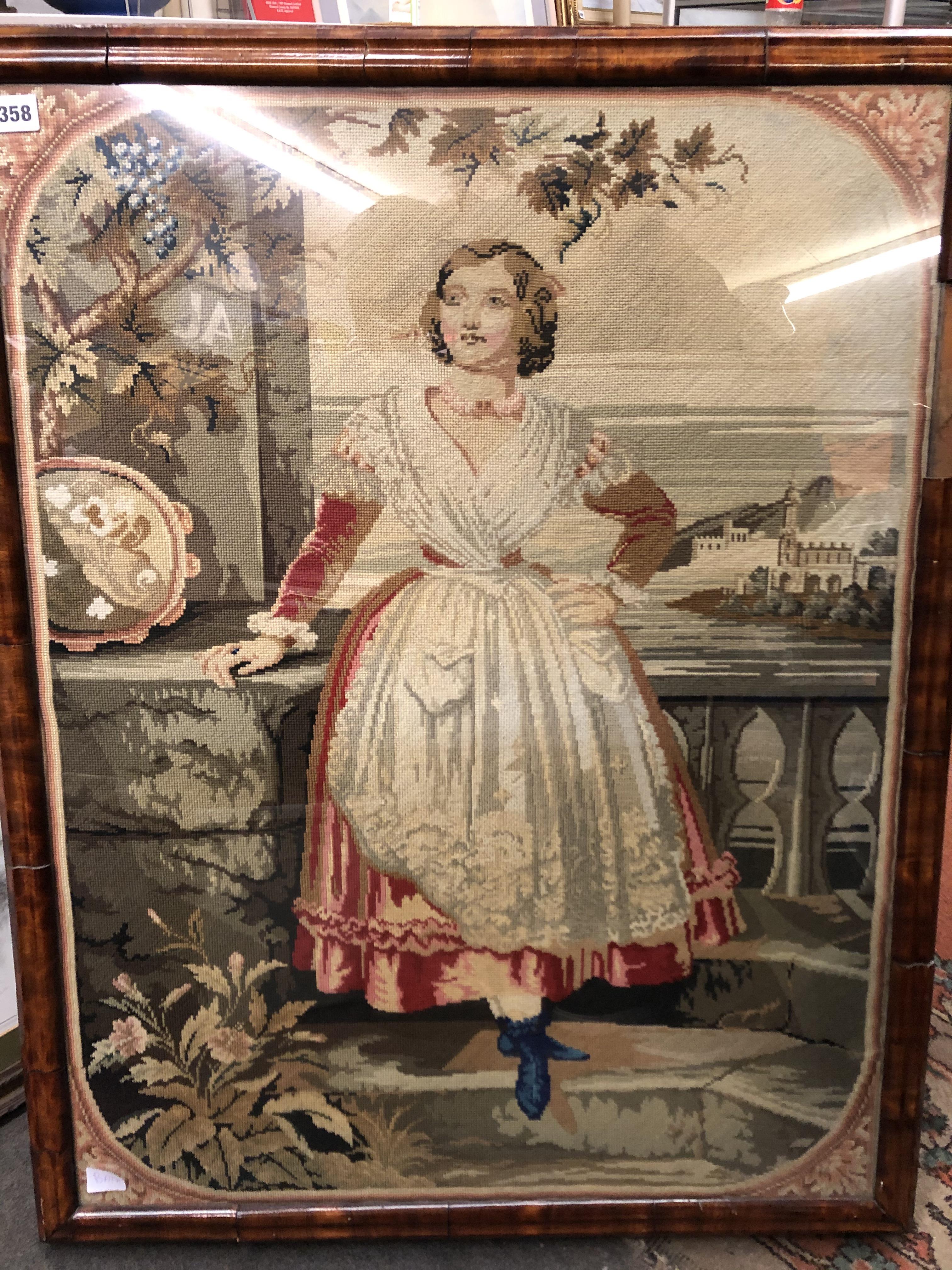 NEEDLEWORK EMBROIDERY OF A FEMALE FIGURE WITH ACANTHUS BORDER IN WALNUT FRAME A/F 65CM X 86CM