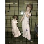 NAO FIGURE 565 OF A GIRL YAWNING AND NAO FIGURE 1109 SO SHY