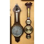 VINTAGE OAK ANEROID BAROMETER AND A REPRODUCTION BANJO BAROMETER