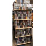 FIVE SHELVES OF MISCELLANEOUS AND NEW CDS INCLUDING ERIC CLAPTON, ELVIS PRESLEY, MOZART, BEETHOVEN,