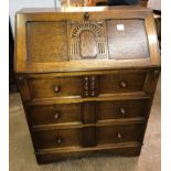 REPRODUCTION OAK BUREAU WITH ARCADED CARVED FALL FLAP