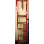 RED METAL FIVE TREAD STEP LADDERS AND ONE OTHER