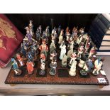 CHESS BOARD AND NAPOLEONIC REGIMENTAL CHESS PIECES AND ONE OTHER PIRATE RELATED SET