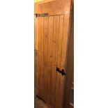 PINE PANELLED BACK DOOR WITH IRONWORK STRAP HINGES AND LATCH HANDLE 67CM W X 4CM D X 191CM H