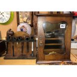 OAK GLAZED DOOR SMOKERS CABINET AND A RACK OF MISCELLANEOUS PIPES