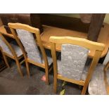 LIGHT WOOD OVAL EXTENDING TABLE AND SIX CHAIRS