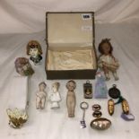 BOX CONTAINING A MISCELLANAE OF BISQUE HEAD CERAMIC MINIATURE DOLLS, MOTHER OF PEARL SHELL BOX,