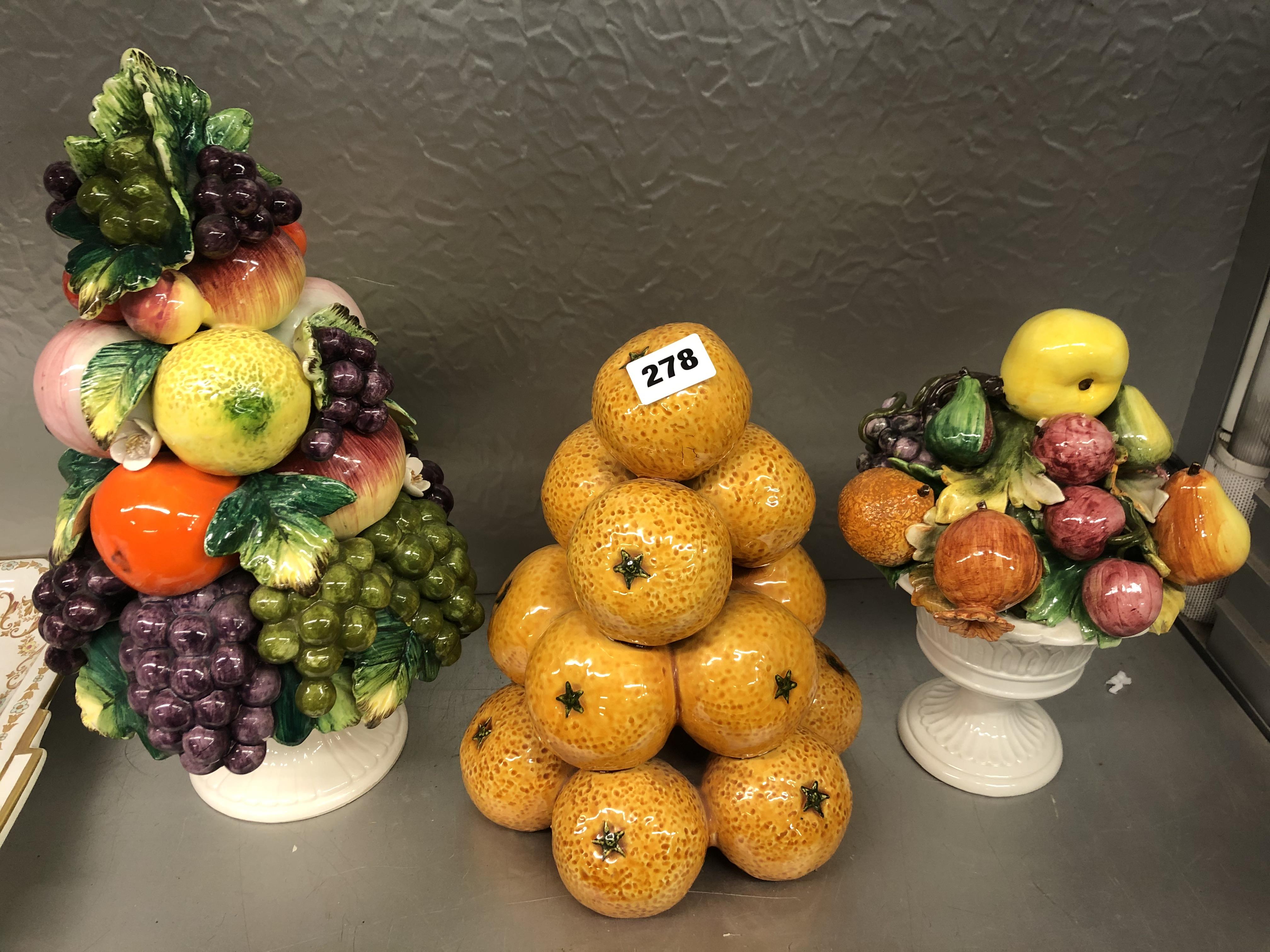 ITALIAN POTTERY BOWLS OF MIXED FRUIT AND A TOWER OF SATSUMAS