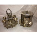 EPBM OCTAGONAL ENGRAVED BISCUIT BARREL AND PLATED SIX PLACE EGG CRUET WITH SPOONS