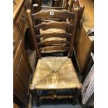 THREE ELM WAVY LADDERBACK AND RUSH SEATED CHAIRS