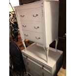 TWO WHITE PAINTED THREE DRAWER CHESTS