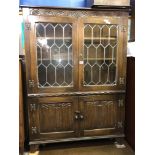 OAK CARVED LINENFOLD LEADED GLAZED CABINET H 135 W 99 D 34CM APPROX